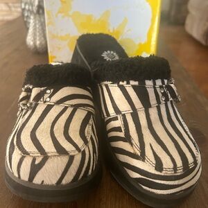 Only worn once. Still in plastic packaging & original box. They are so so cute.